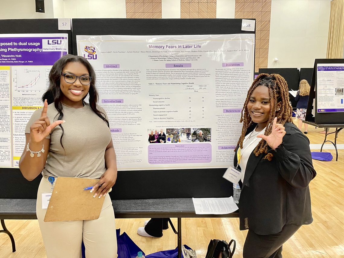 Students presenting a research poster