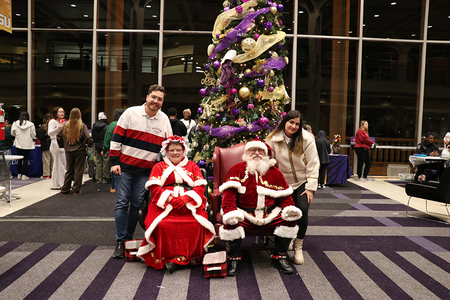 family with Santa and Mrs. Claus