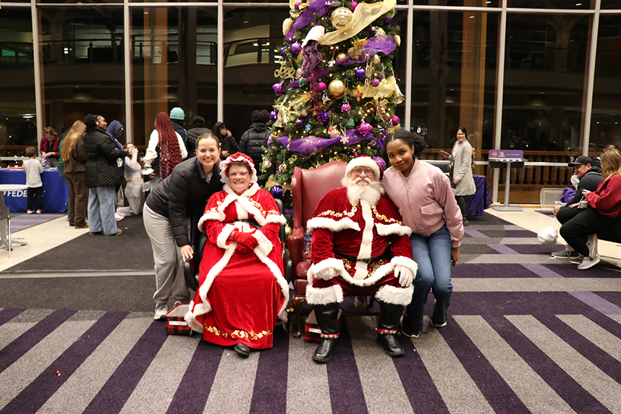 students with Santa and Mrs. Claus